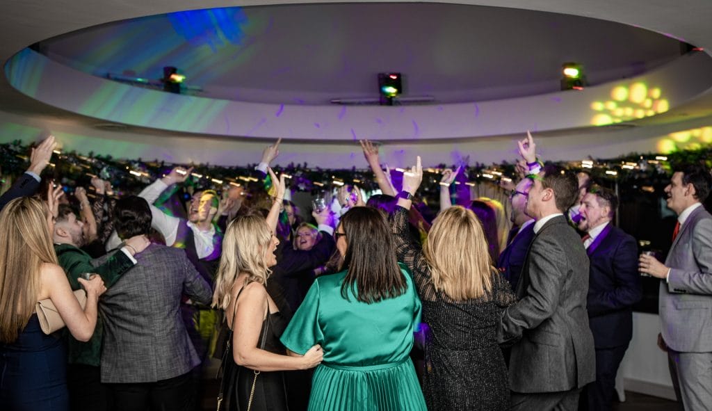 Group partying and dancing in the function suite at Birchwood park