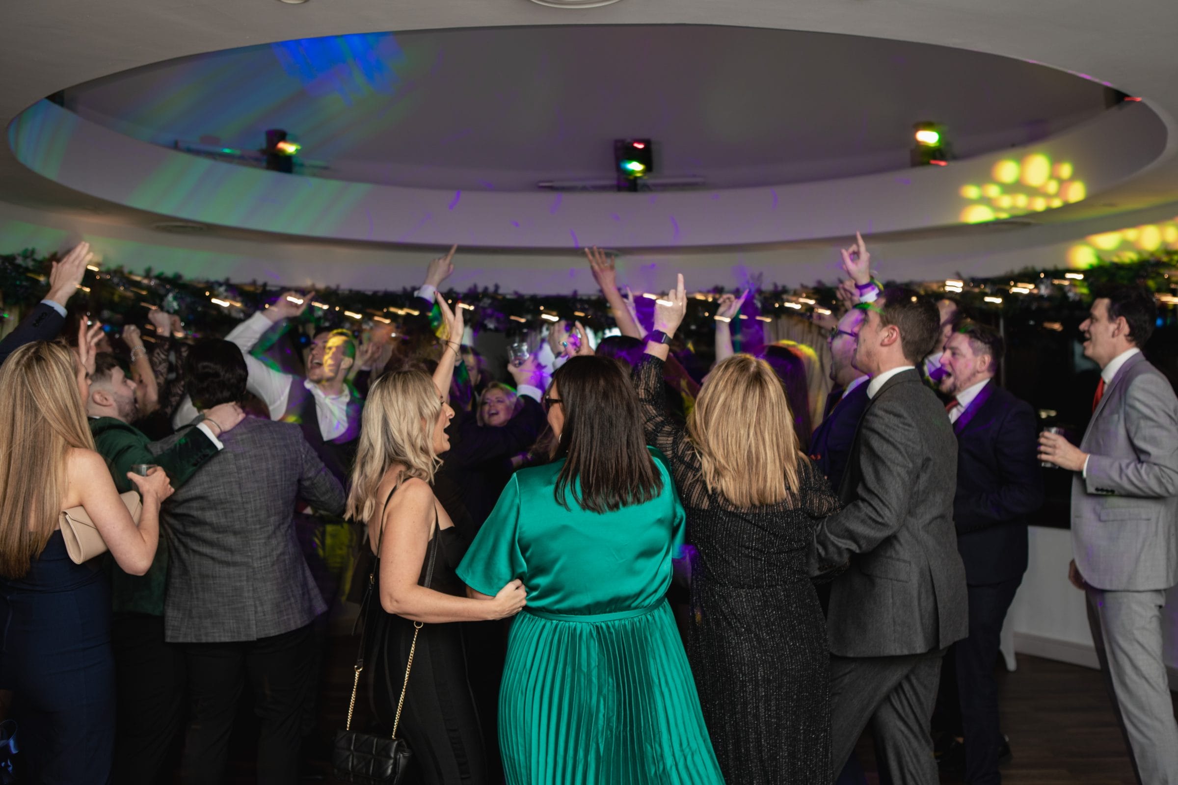 people dancing at christmas party in kent