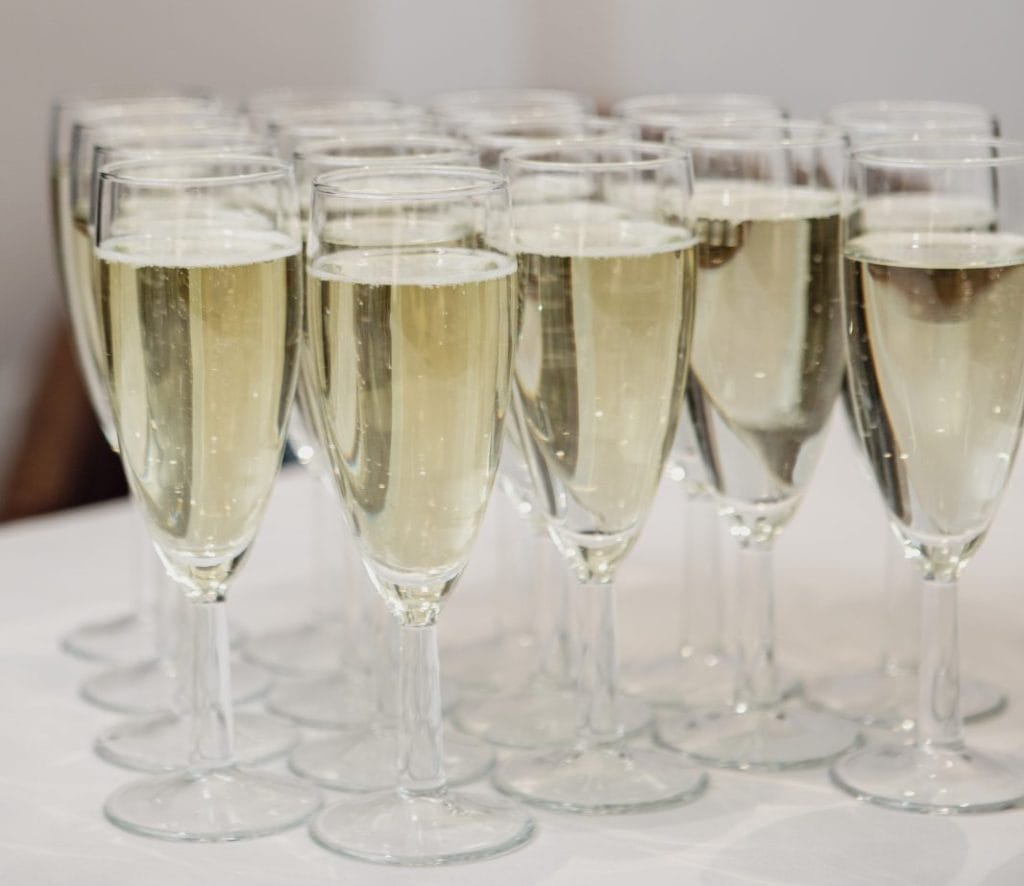 Arrival drinks of prosecco at party in Dartford