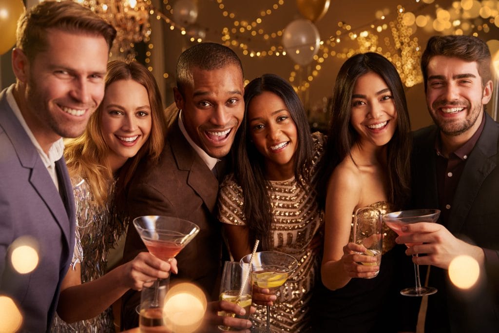 Group celebrating a corporate party in dartford with drinks