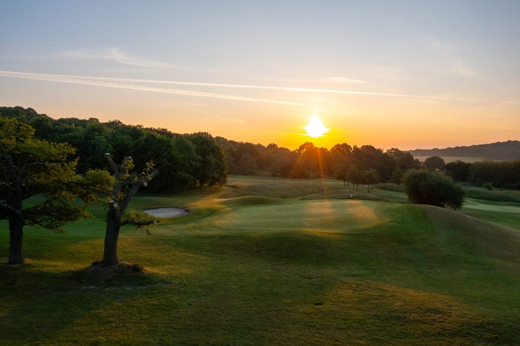 sun setting over golf club in dartford