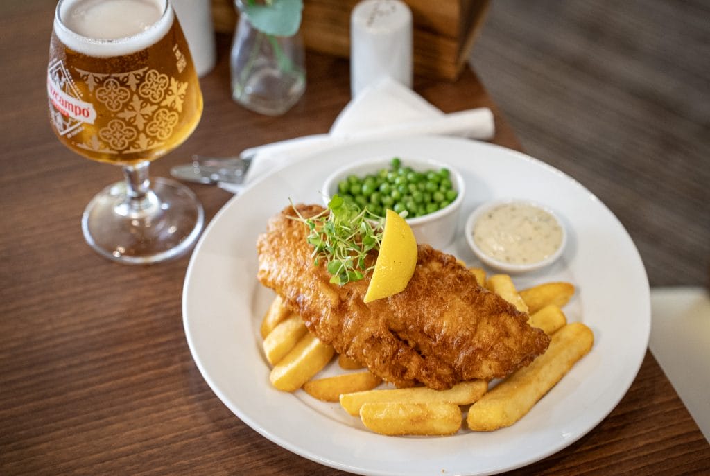 Plate of fish and chips in restaurant in kent