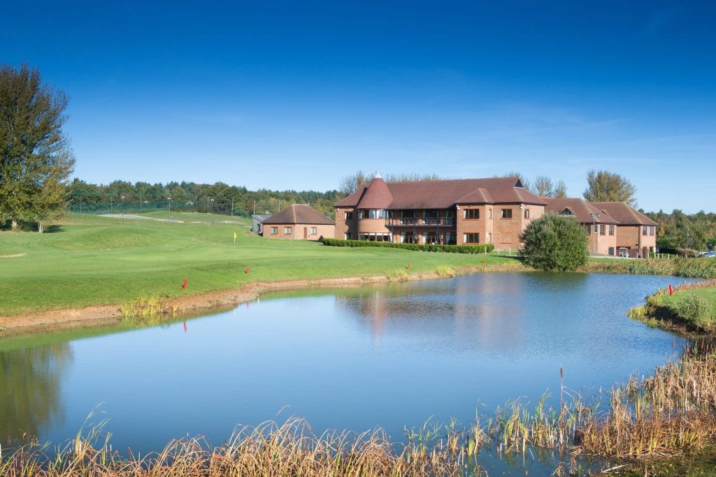 Outside view of Birchwood Park with lake